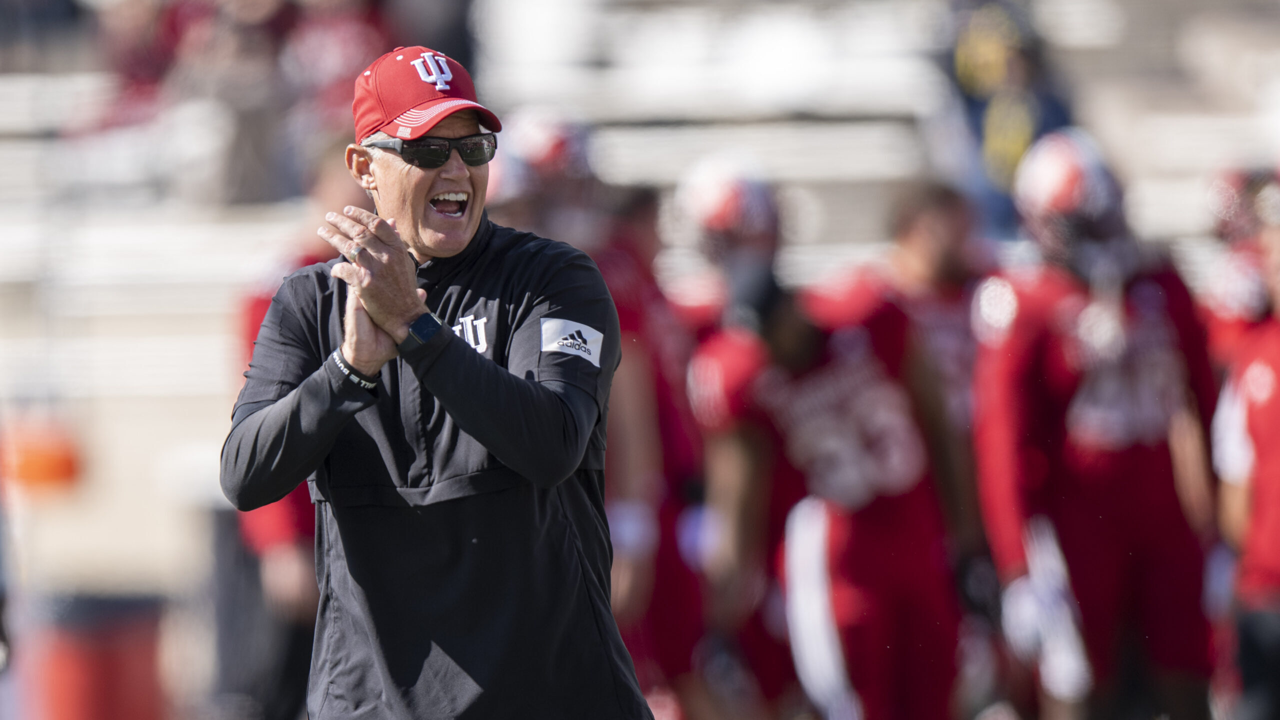 Oct 8, 2022; Bloomington, Indiana, USA; Indiana football head coach Tom Allen yells and claps at his team during warmups before the game against the against the Michigan Wolverines at Memorial Stadium. Mandatory Credit: Marc Lebryk-USA TODAY Sports